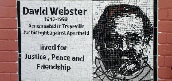The mosaic plaque on the wall of the David Webster Park